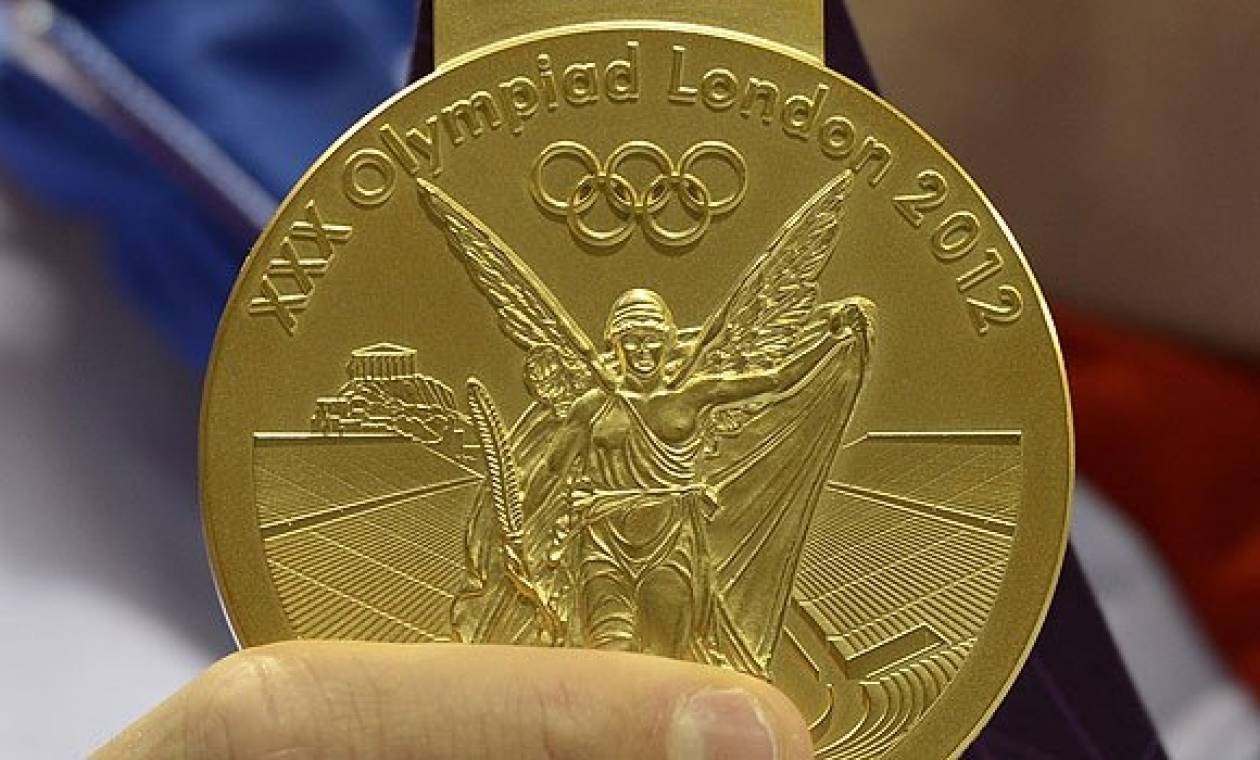 Из какого металла сделана медаль 90 лет. Медали Лондон 2012. Медали Олимпийских игр 2012. Олимпийская медаль 2012. Олимпийское золото 2012.