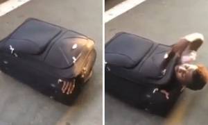 Μετανάστης ταξίδεψε από την Ιταλία στην Ελβετία μέσα σε... βαλίτσα! (pics+vid)