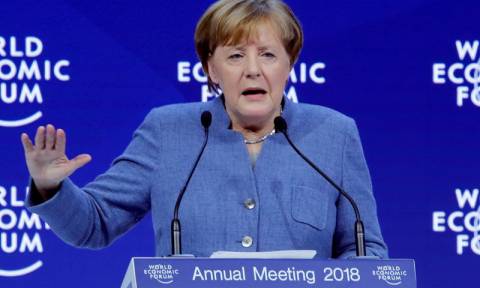 Νταβός - Μέρκελ: Η Γερμανία θα συνεχίσει να συμβάλει στην λύση των διεθνών προβλημάτων