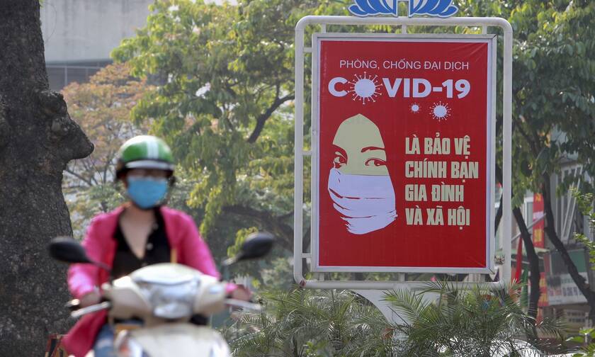 Πινακίδα προστασίας για τον κορονοϊό στο Βιετνάμ