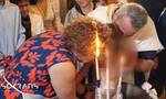 Κρήτη: H viral νονά που «λαμπάδιασε» σε βάφτιση αποκαλύπτει - «Έχασα τούφες αλλά ακόμα γελάμε»
